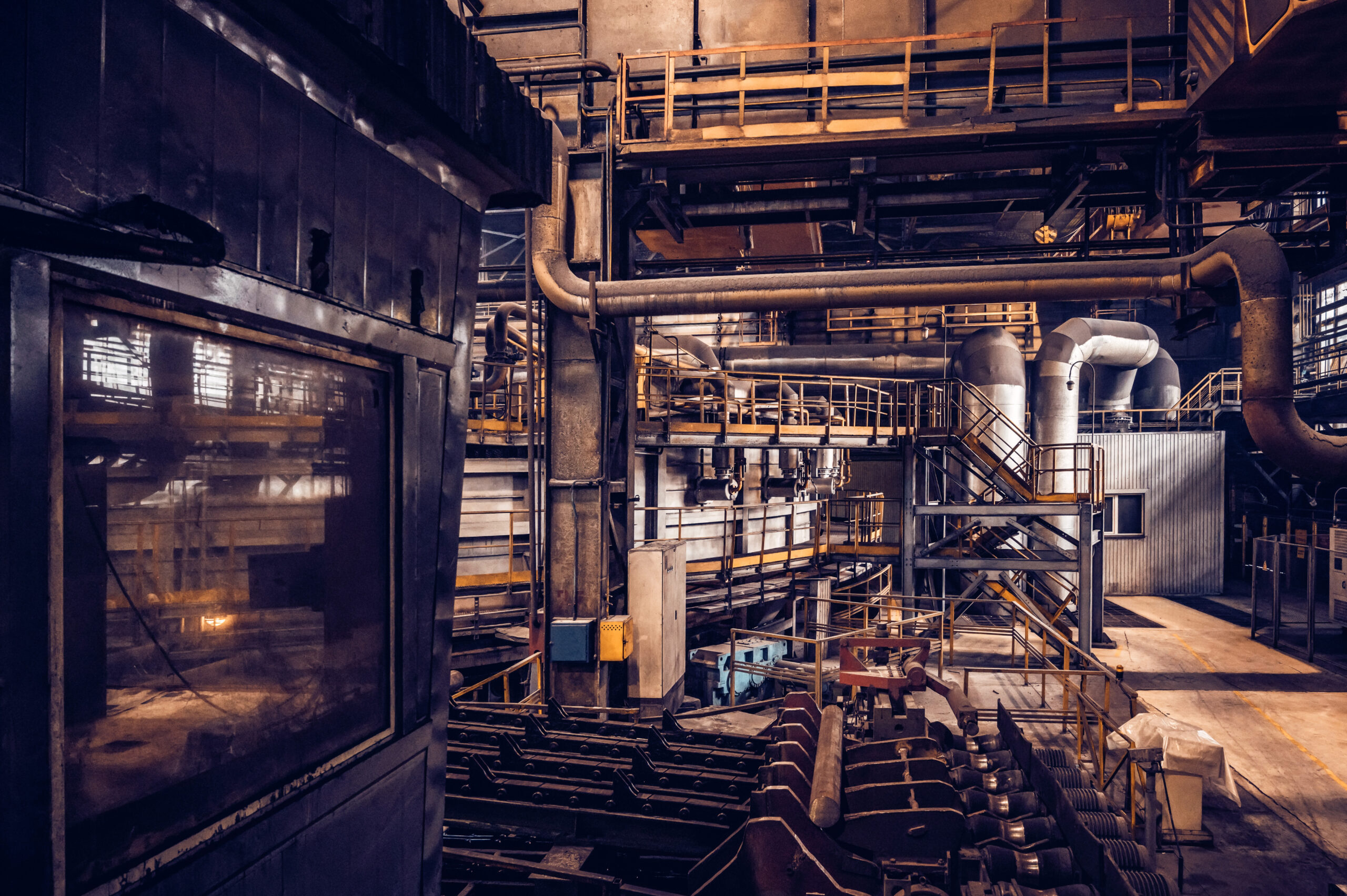 Industrial machinery and pipework inside a factory
